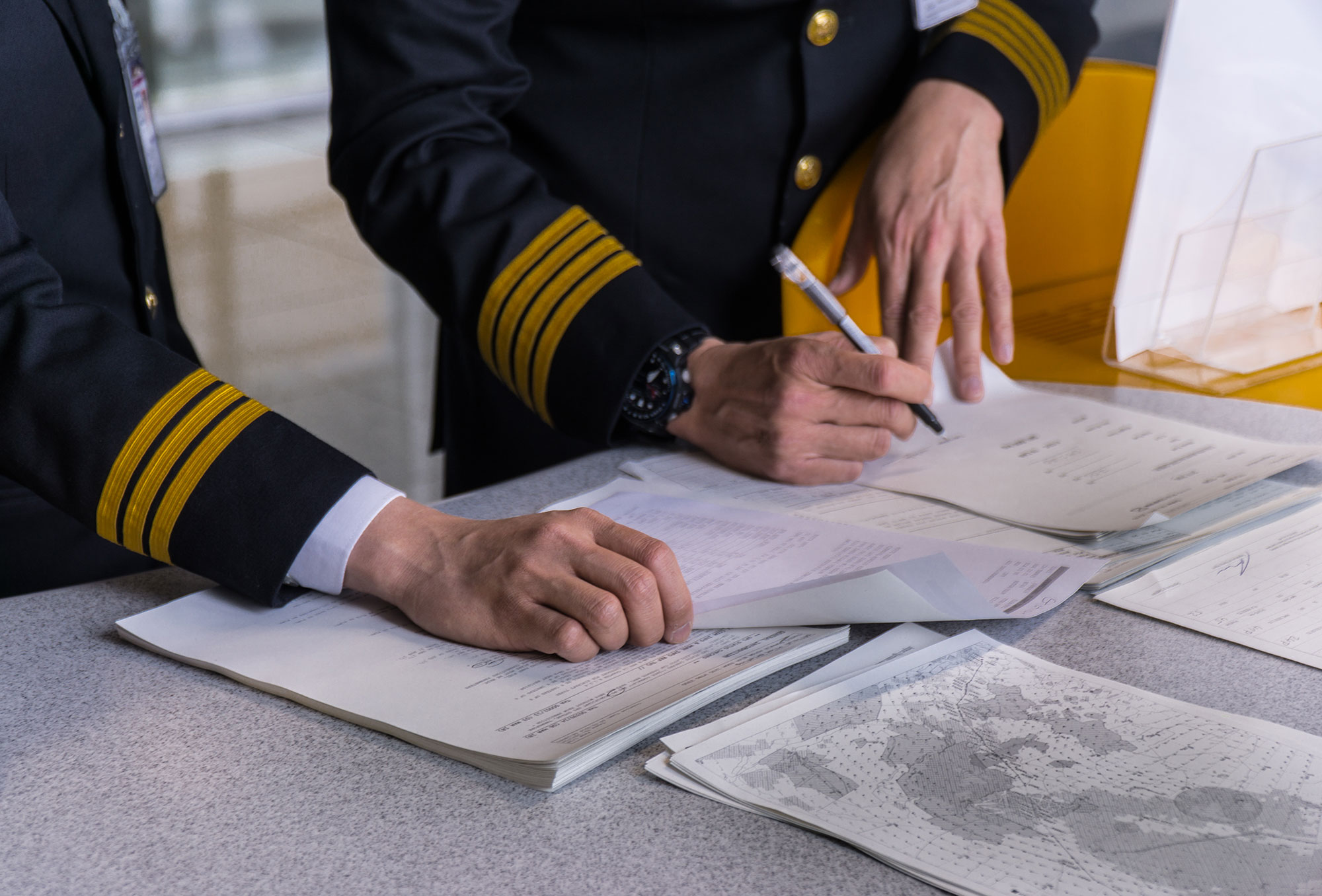 Pilots reviewing documents